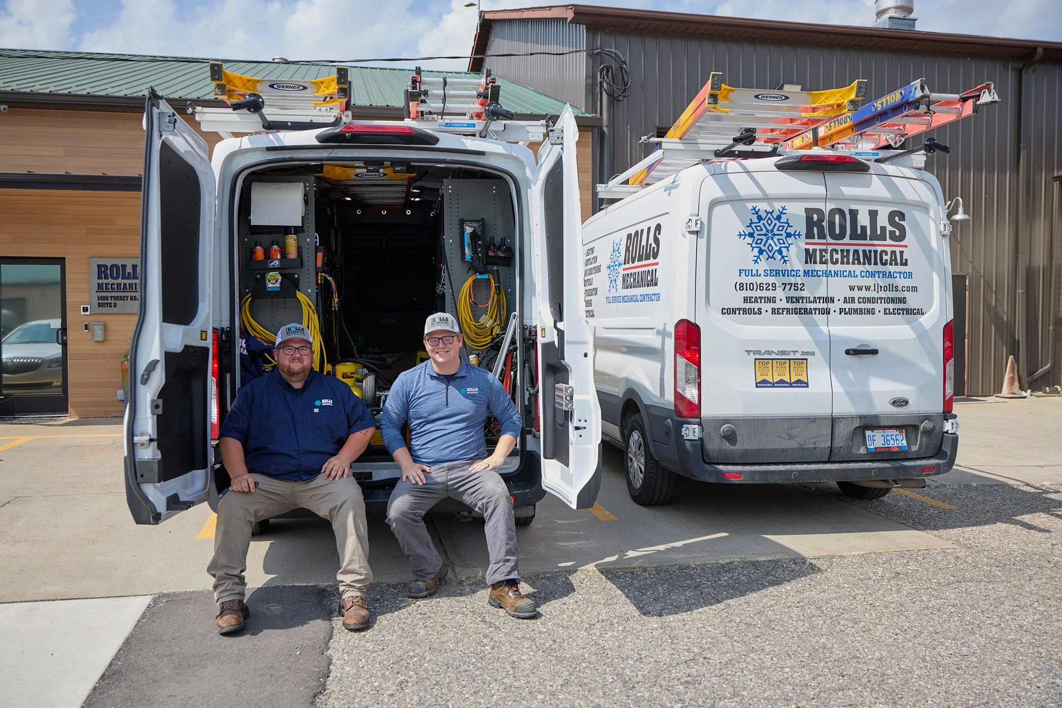 HVAC services in Michigan with Rolls Mechanical contractors sitting in the back of their service van.
