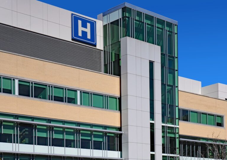 Modern style building with large H sign for hospital