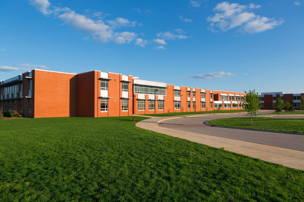 modern school building with lawn