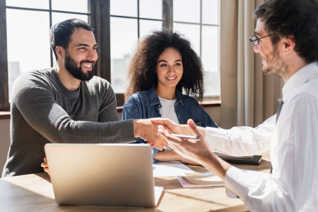 electrical panel upgrade young couple signing papers with bank company