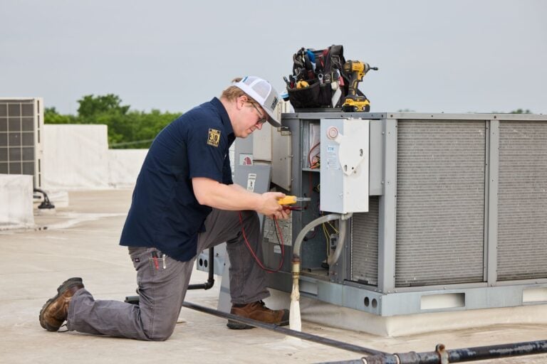 Rolls Mechanical team member working on a repair