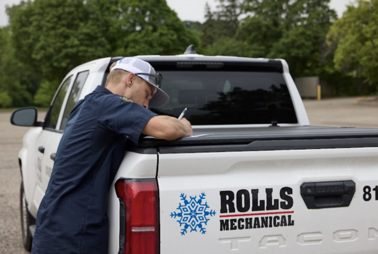 Rolls Mechanical truck and team member