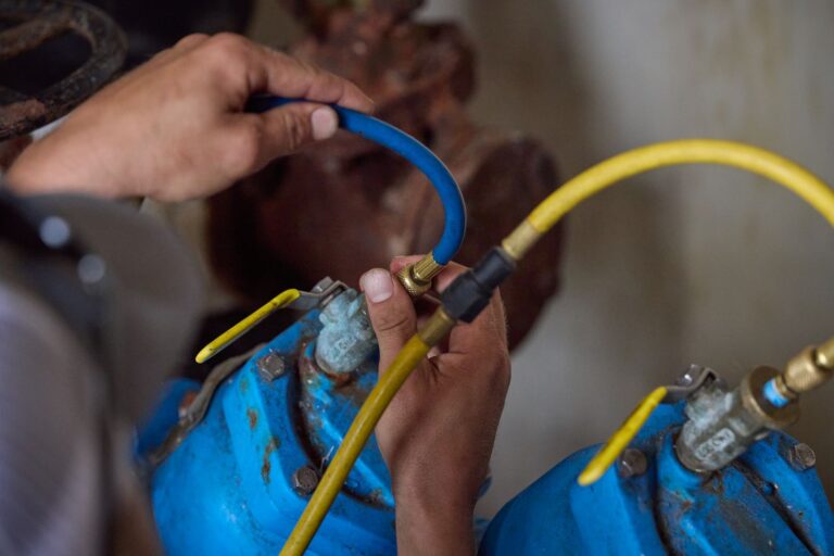 Close-up of a plumber's hands