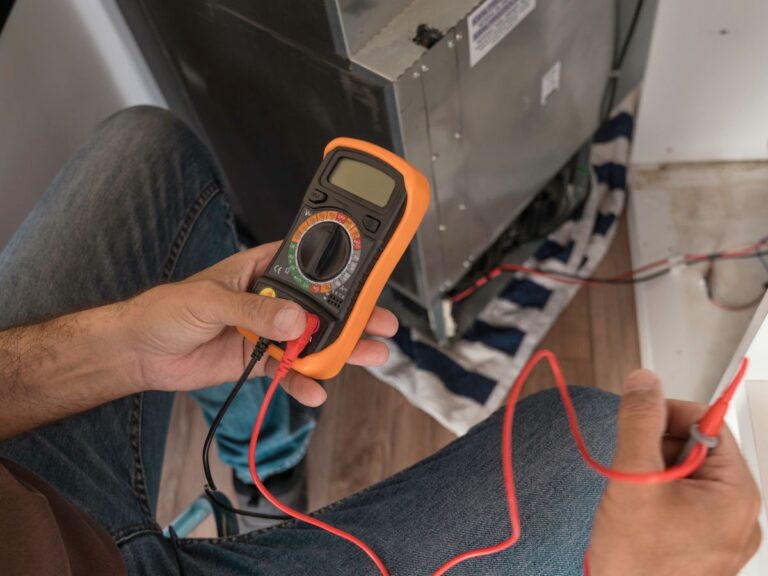 refrigeration farmington hills worker repairing unit