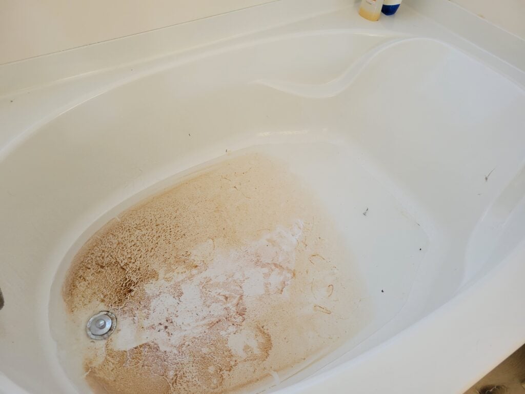 hydro jet drain cleaning backed up pipes in a bathroom . High quality photo